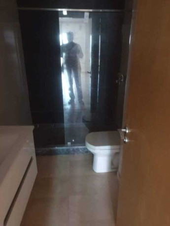appartement-2-chambres-salon-vide-bd-ziraoui-big-0